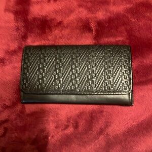 Charter Club wallet-genuine leather, black colored w/gold snaps inside.